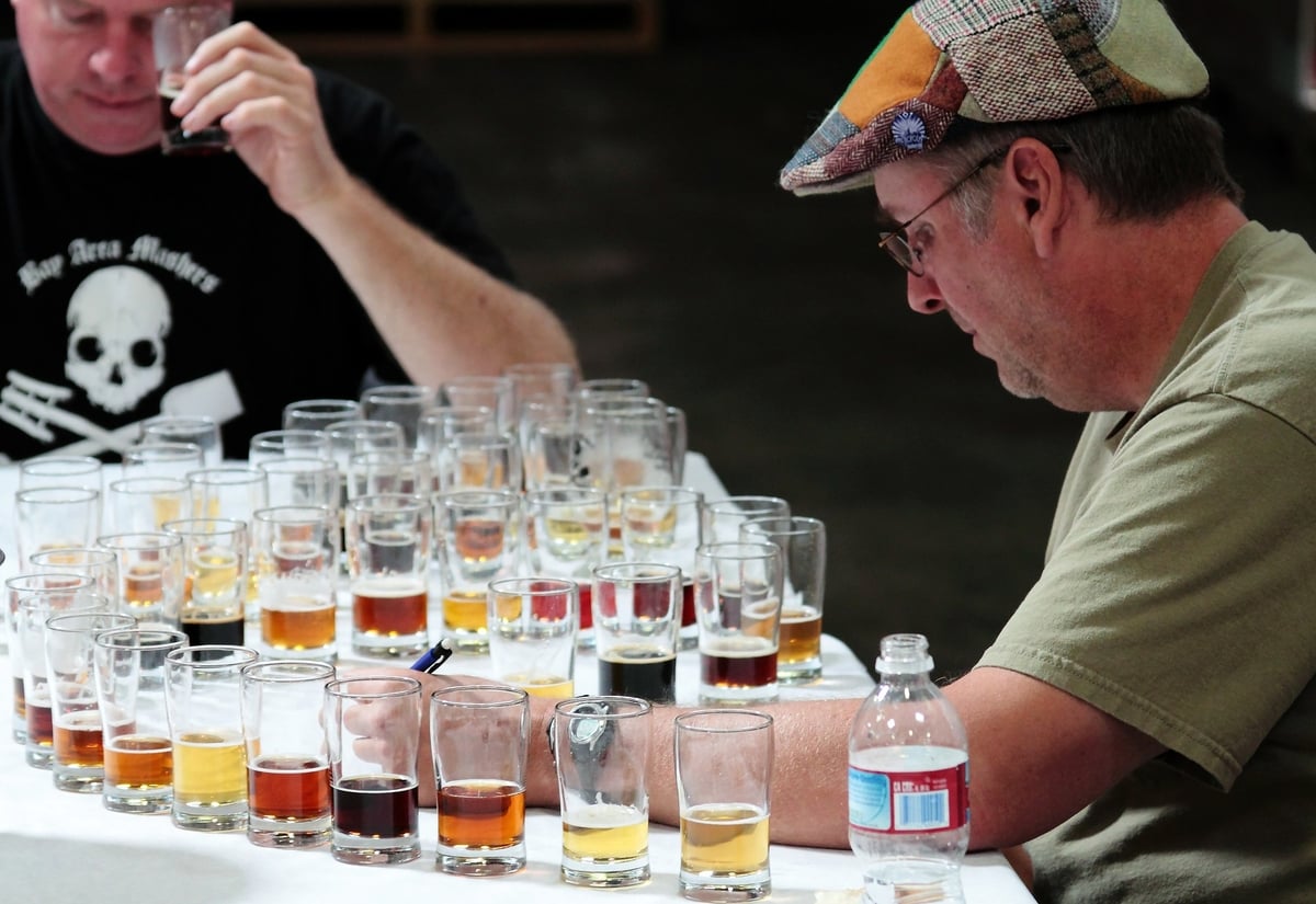 judges reviewing many beers