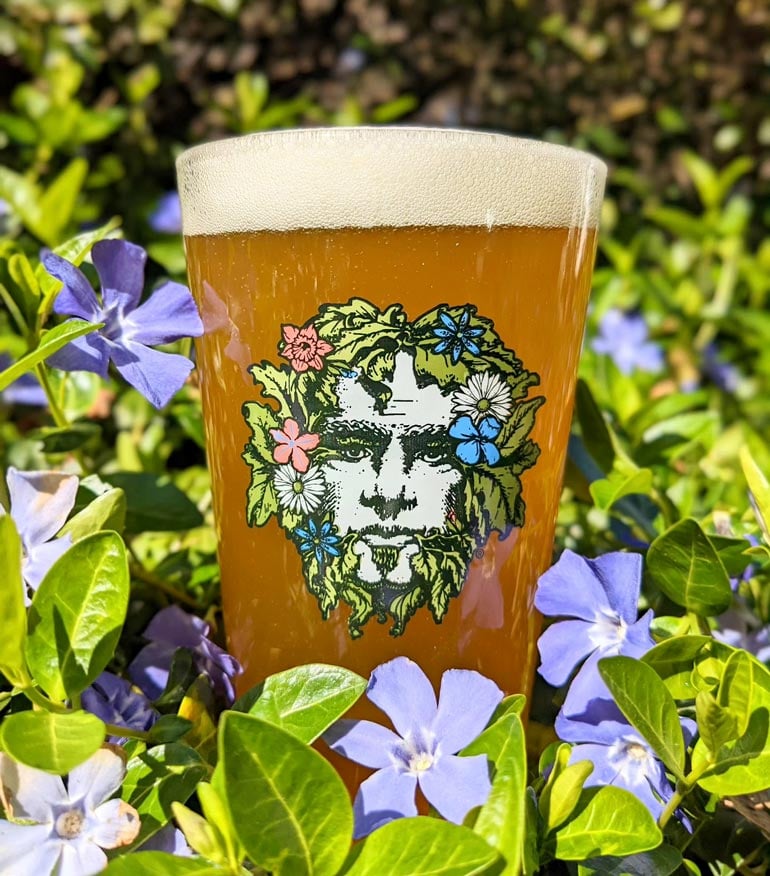 green man spring seasonal glassware sitting outside on lush vegetation