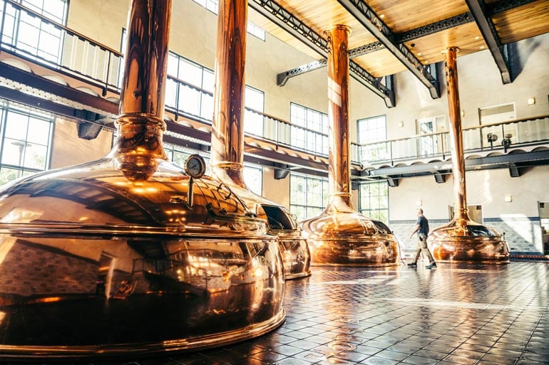 fermentation tanks glistening in the sun at sierra nevada brewing asheville location